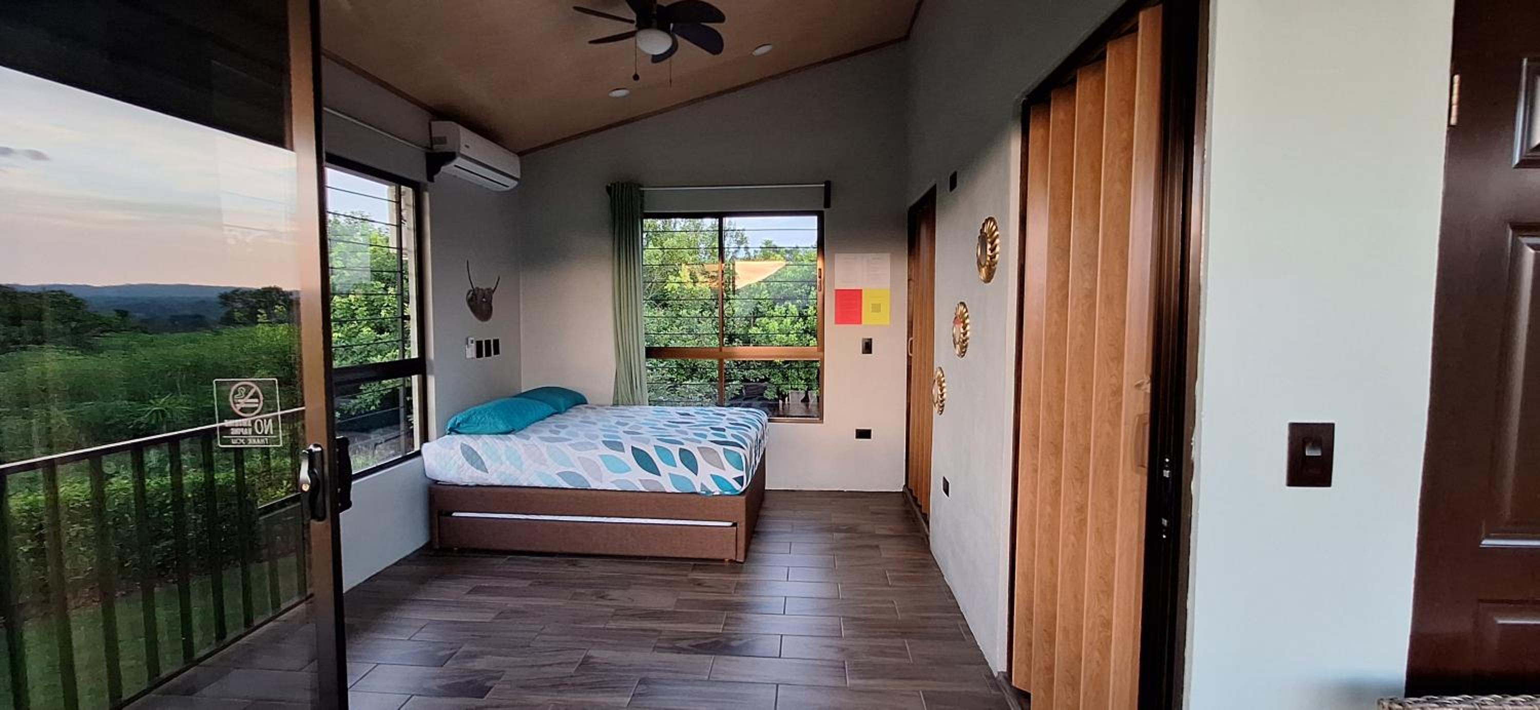 Arenal Nephelium Country Home, Refugio rural con piscina, jacuzzi y balcón con hermosas vistas al Volcán Arenal, en una finca privada