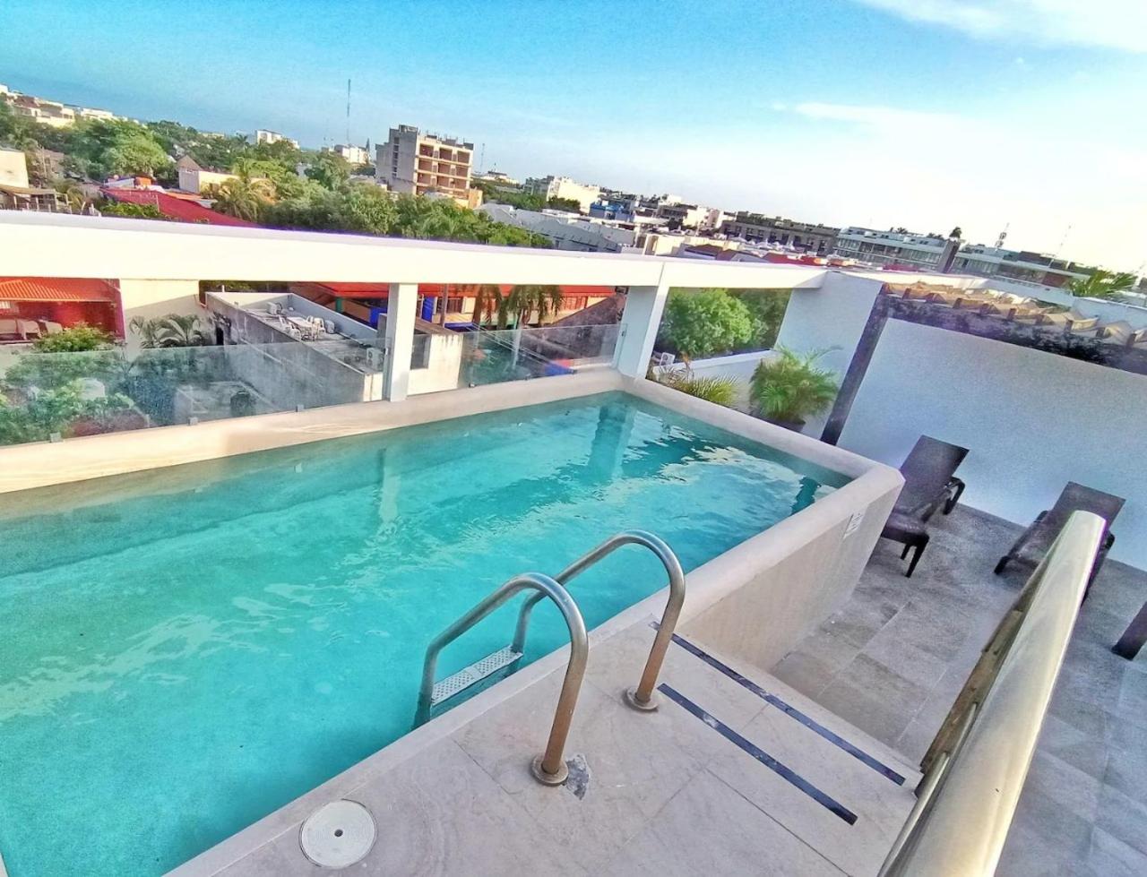 Piscina en la cima Lujoso apartamento en Playa del Carmen