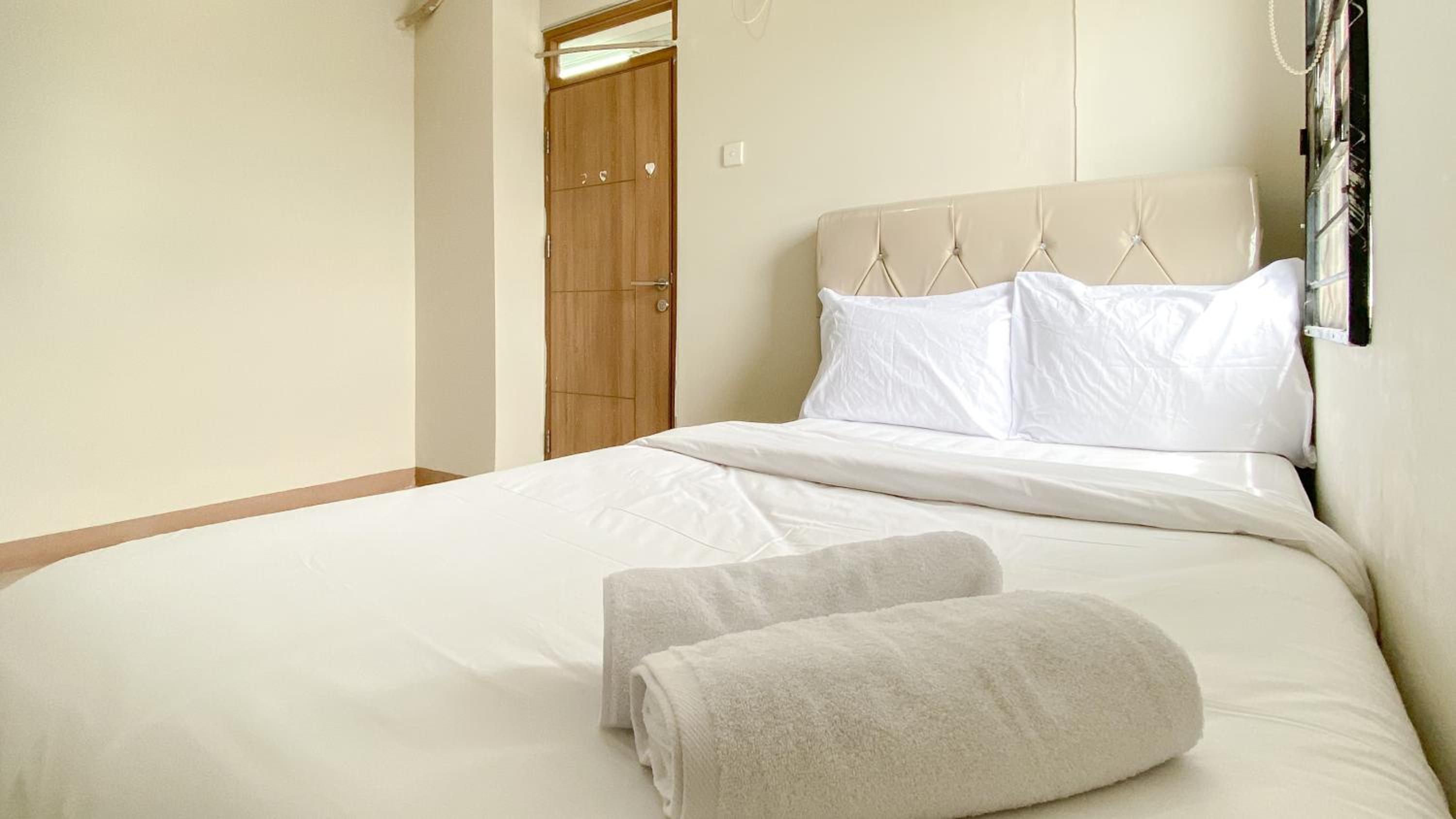 Spacious 3BR Apartment at Green Palm Residence By Travelio