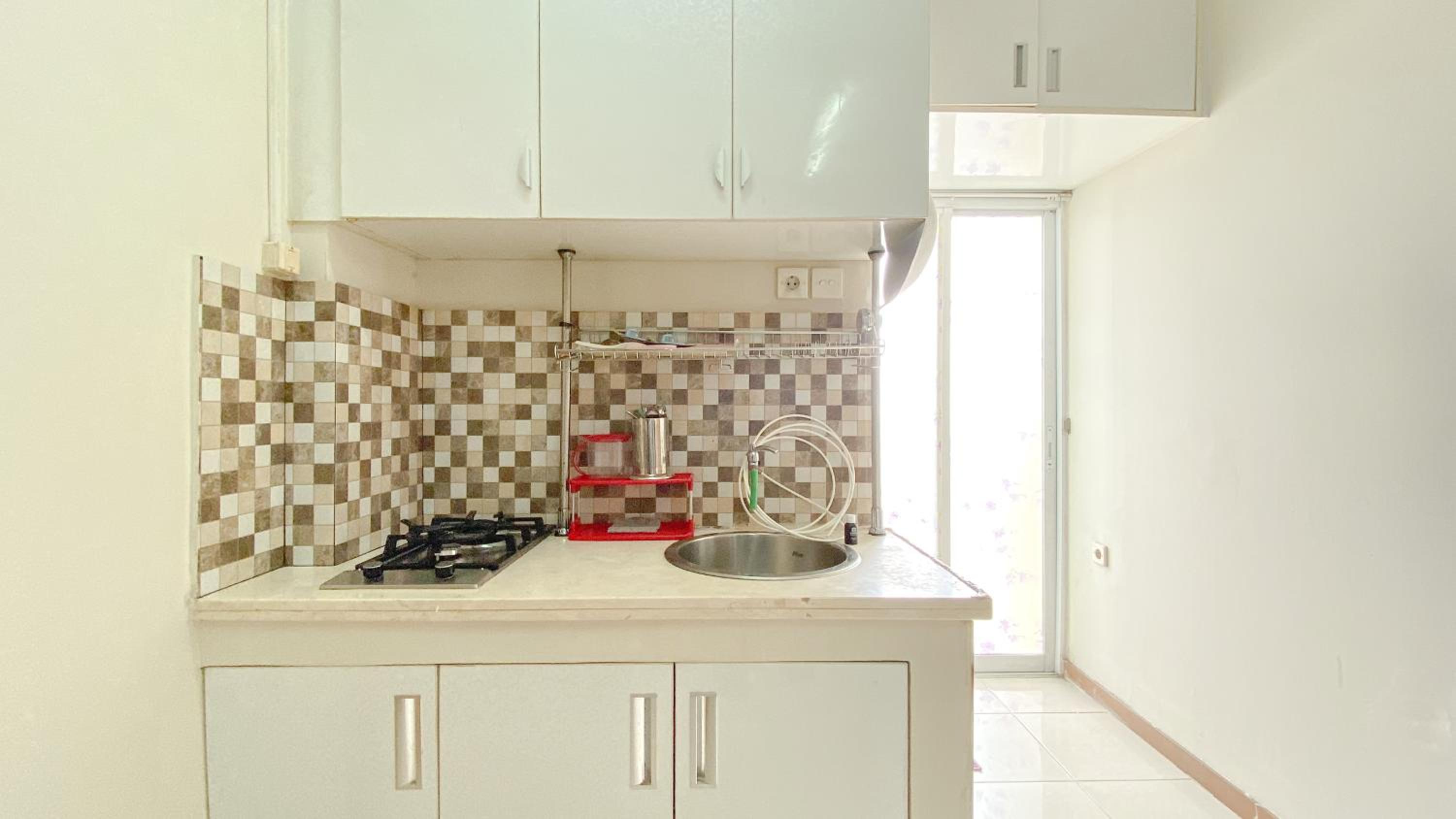 Spacious 3BR Apartment at Green Palm Residence By Travelio