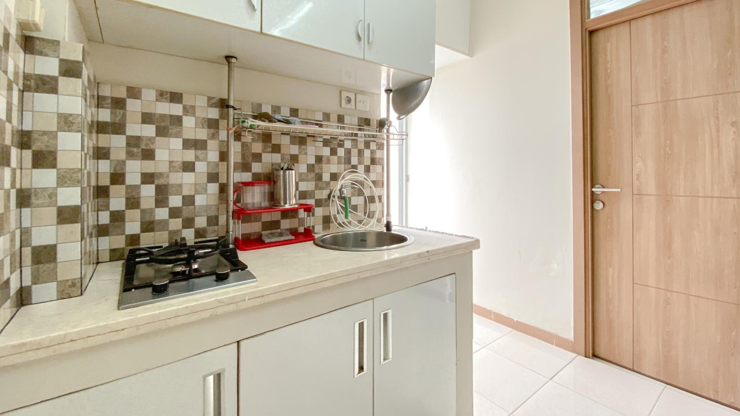 Spacious 3BR Apartment at Green Palm Residence By Travelio