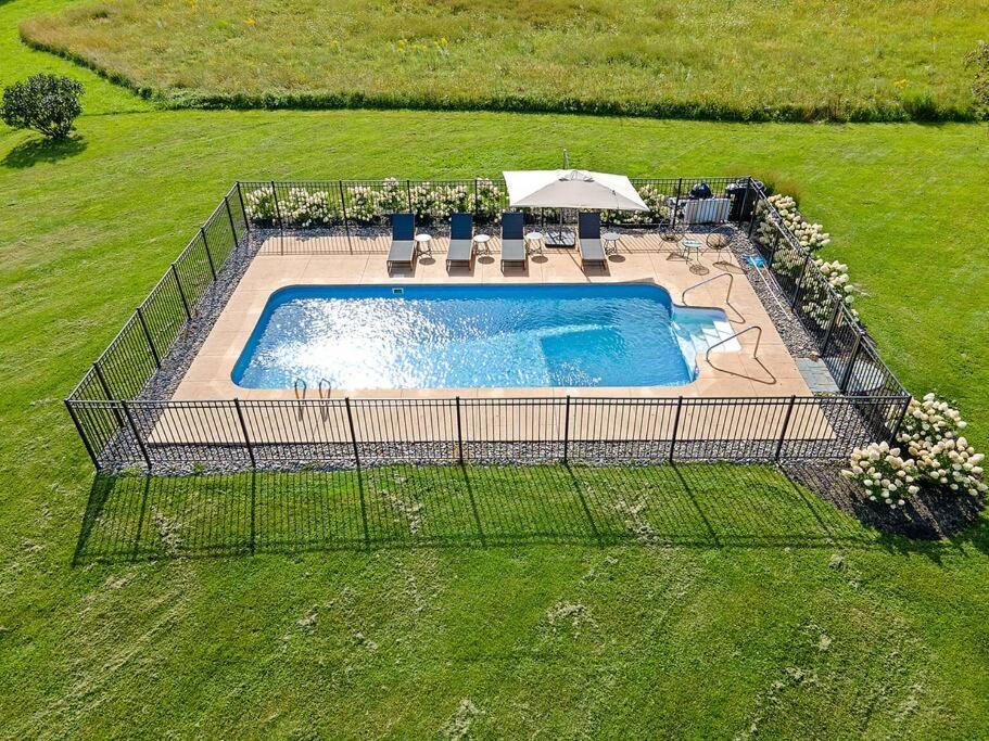 3BR 2BA Colonial Charm Pool HouseLakeViews Gym Deck view 3