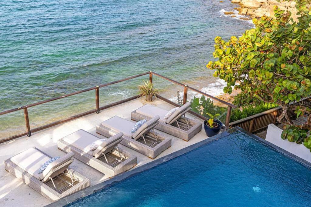 Beachfront Gem Luxury Villa with Infinity Pool view 5