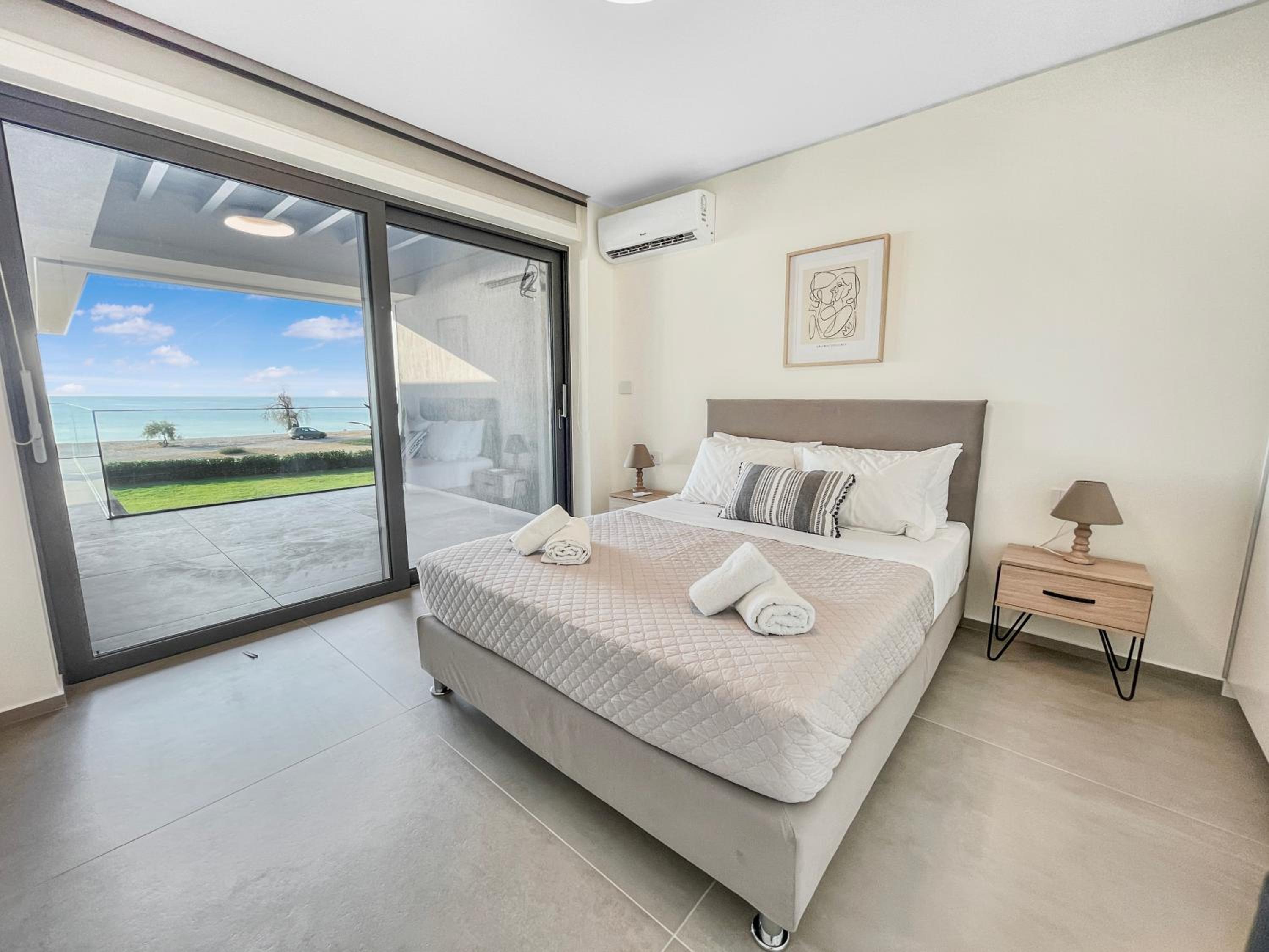 Sun and Sea Apartment - Beachfront, 2 Bedrooms with Sea View & Garden