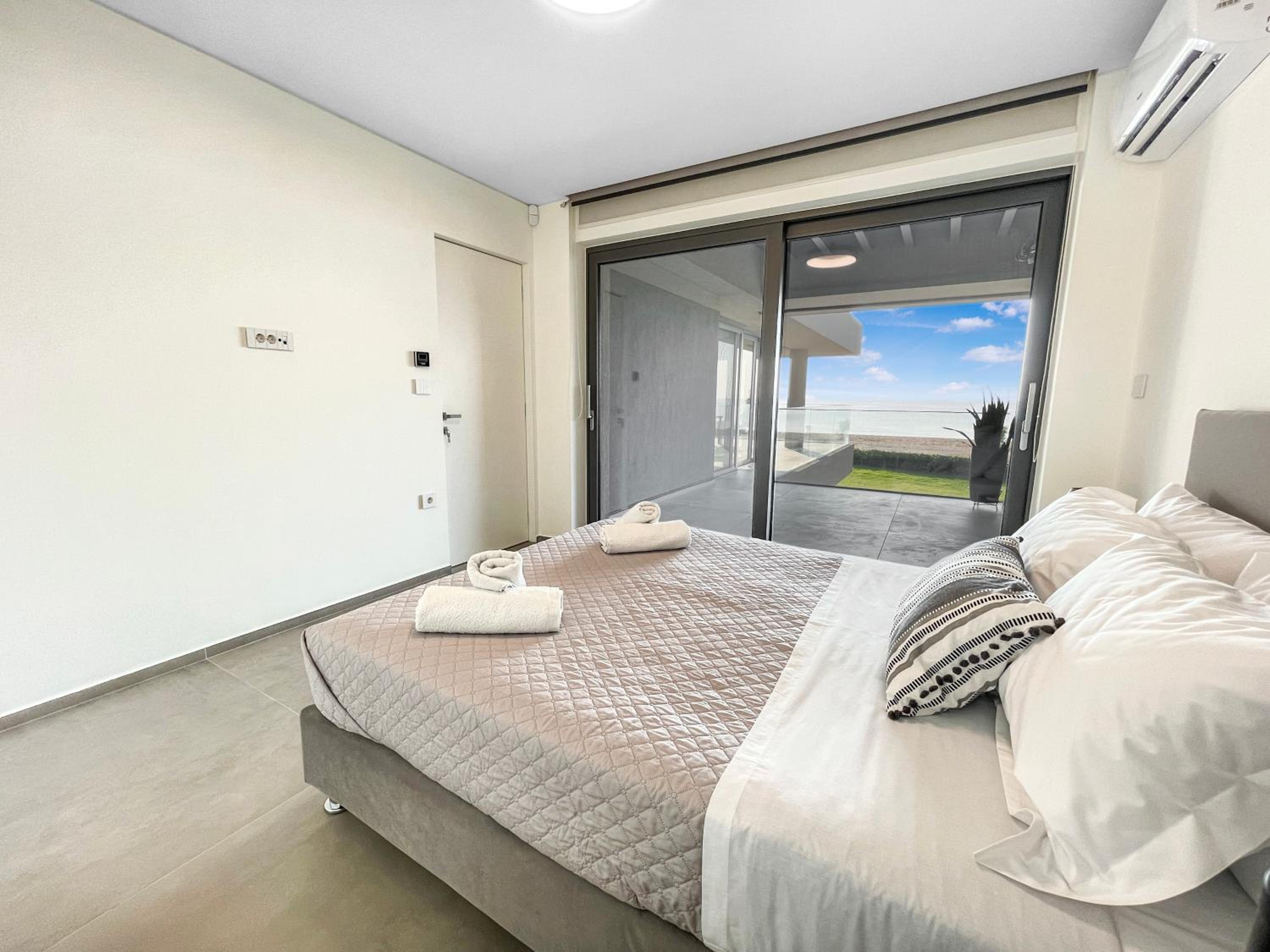 Sun and Sea Apartment - Beachfront, 2 Bedrooms with Sea View & Garden