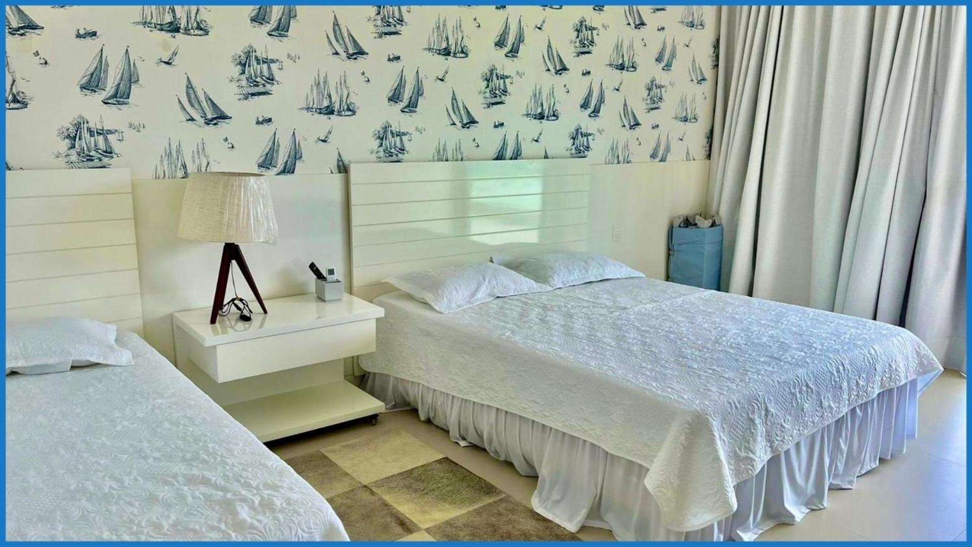Casa Paraíso 6 Suítes Pé na Areia em Guarajuba