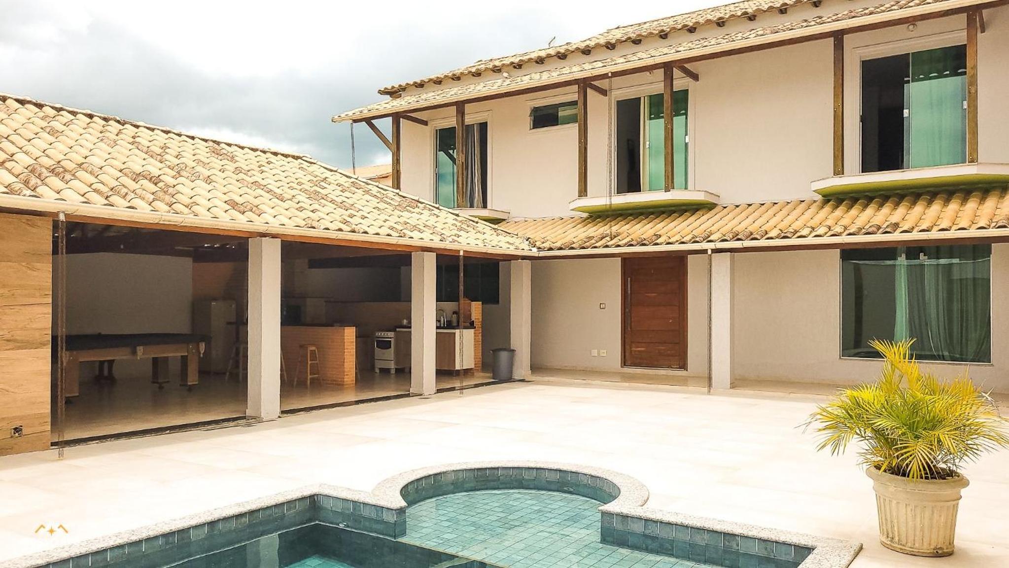 NossoApê Guarua: Piscina | Churrasqueira | Ar-condicionado