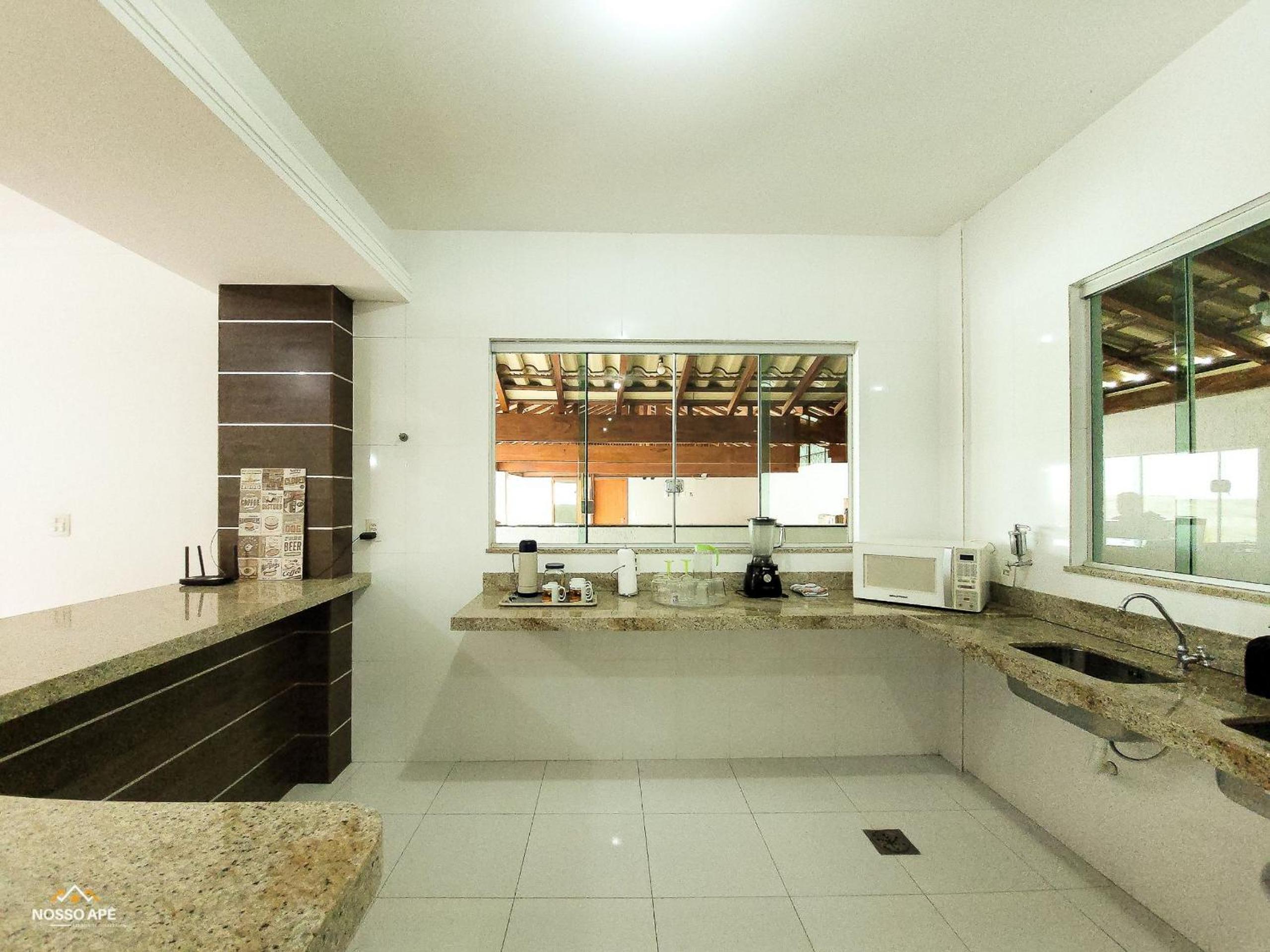 NossoApê Guarua: Piscina | Churrasqueira | Ar-condicionado