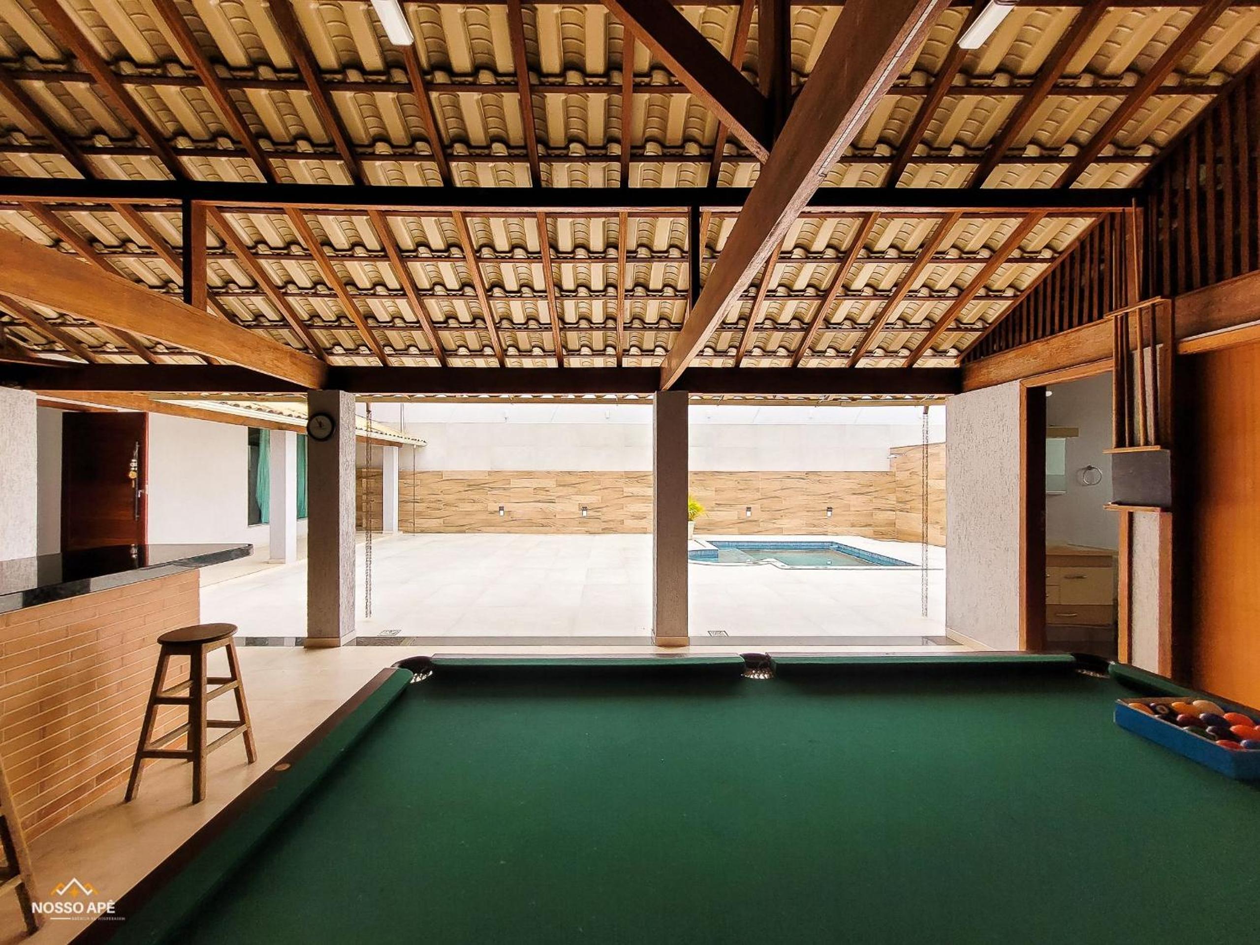NossoApê Guarua: Piscina | Churrasqueira | Ar-condicionado
