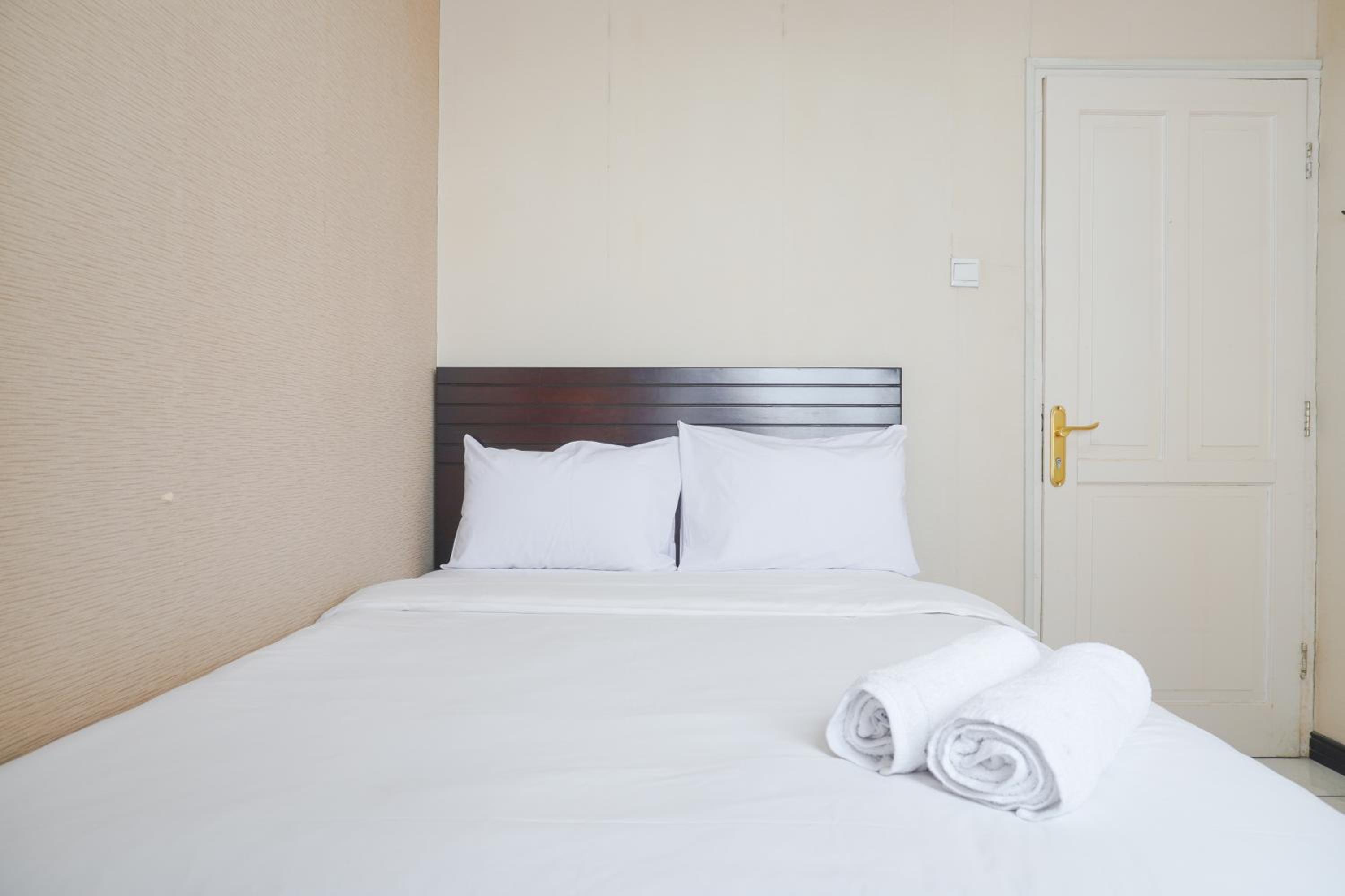 Cozy and Simply Look 2BR at 12nd Floor Puri Garden Apartment By Travelio view 2