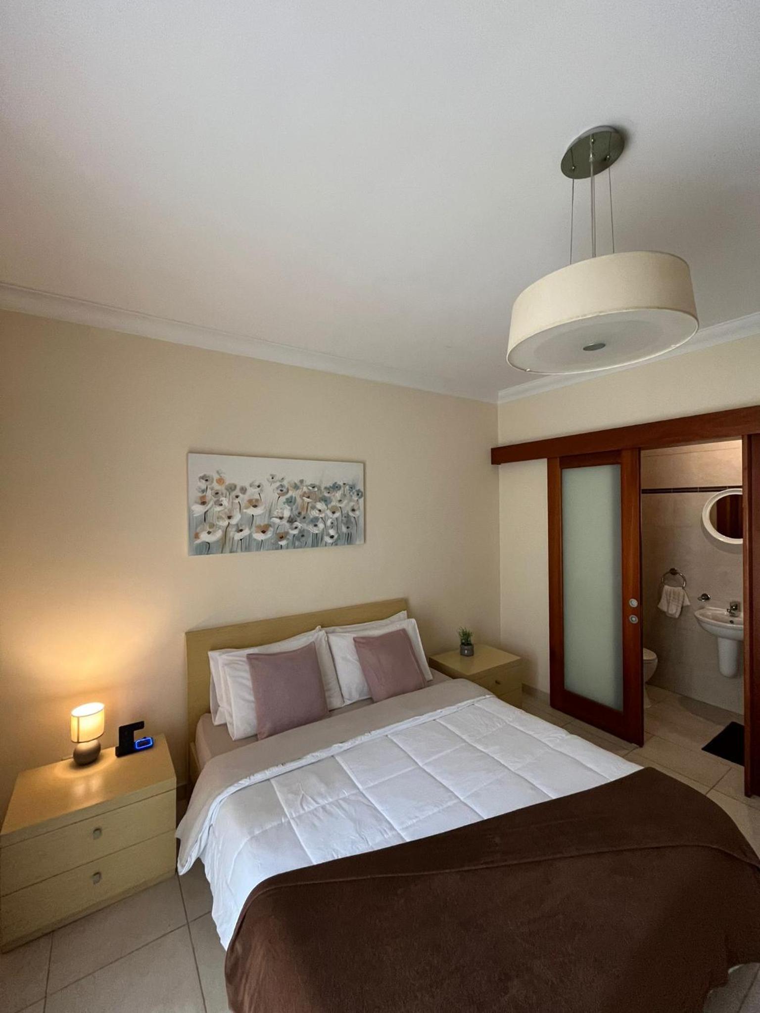 Cozy Room with Private Bathroom and Balcony Views view 2