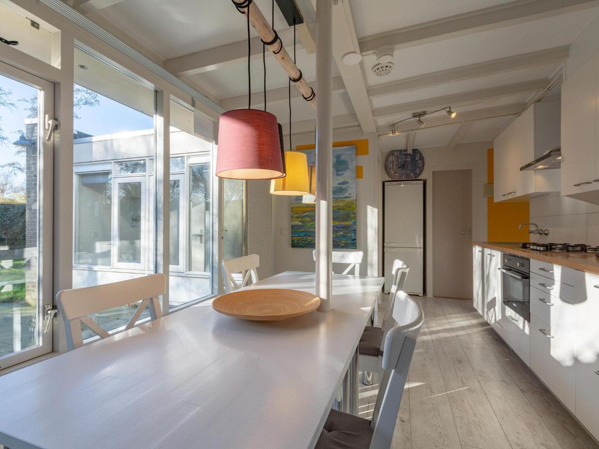 Lovely bungalow on green park with patio view 4