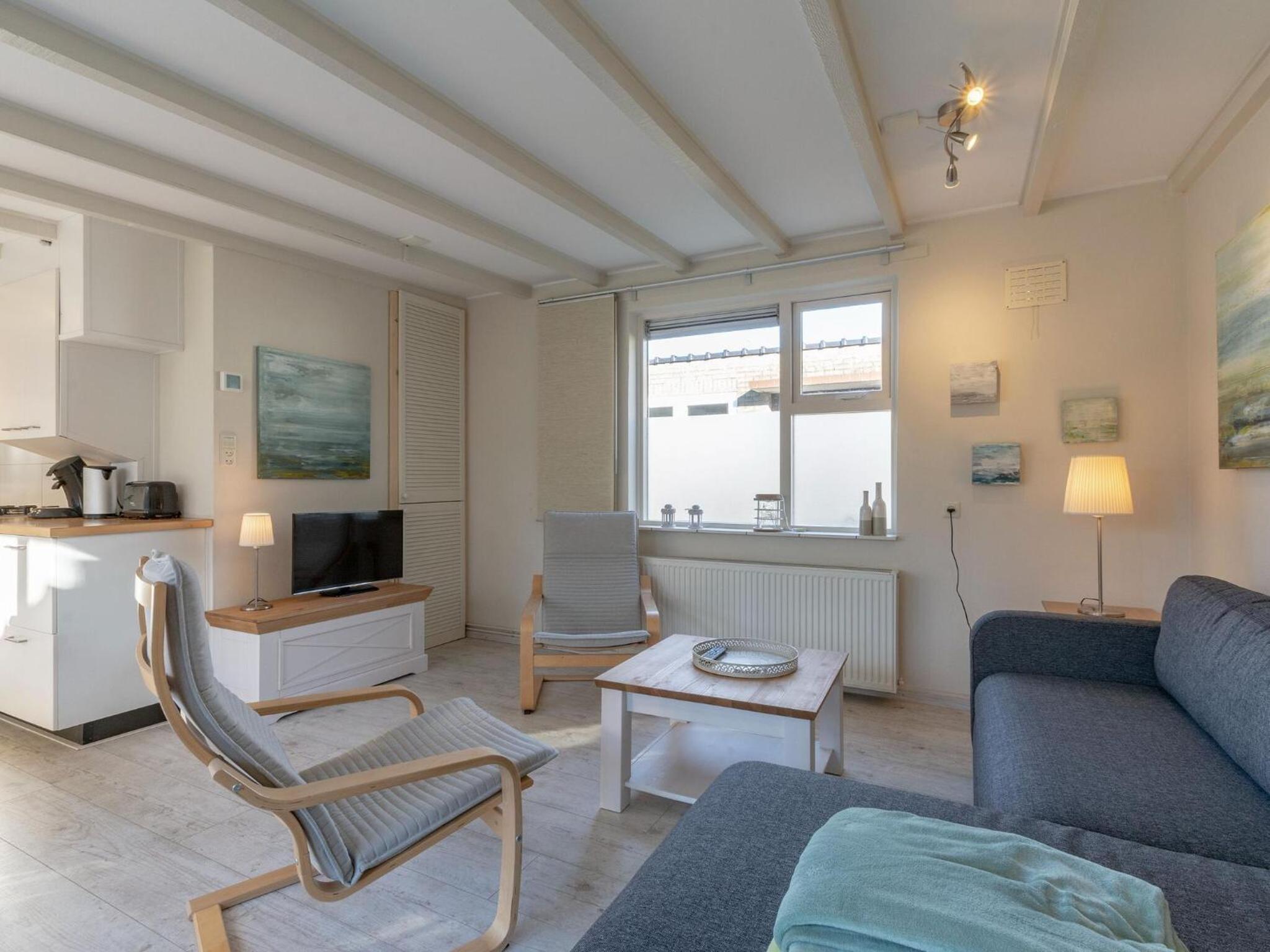 Lovely bungalow on green park with patio view 2