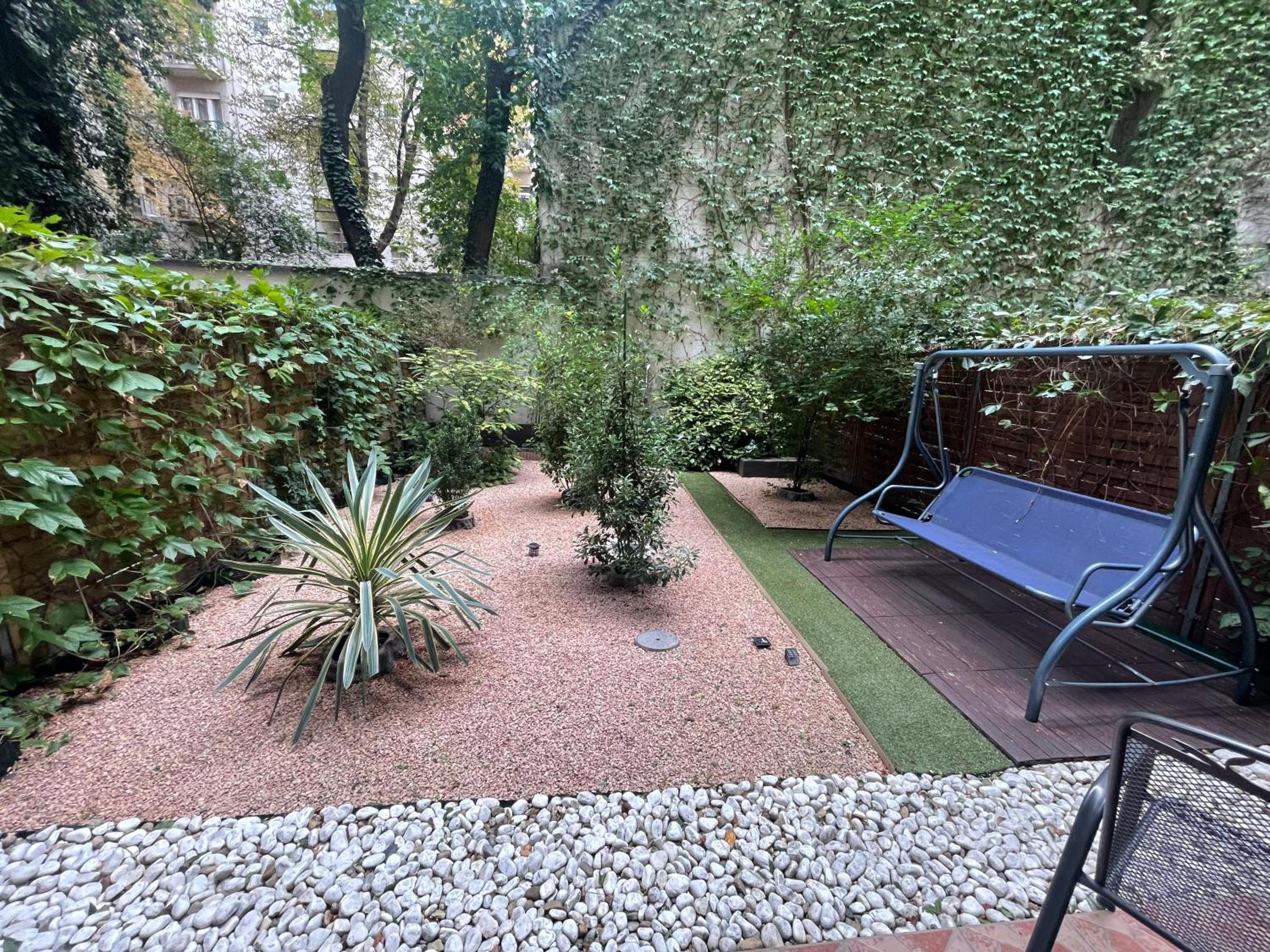 Exclusive Central Apartment with Private Garden