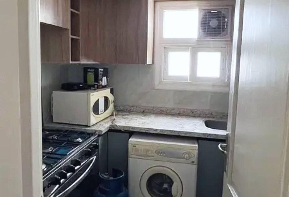 Spacious Cozy 2BR Apartment in B12 Madinaty Modern Balcony with Relaxing Patio AC Near Parks Shopping in New Cairo view 4