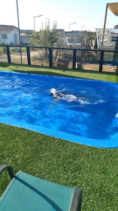 Agradable casa cerca de la playa, piscina internet