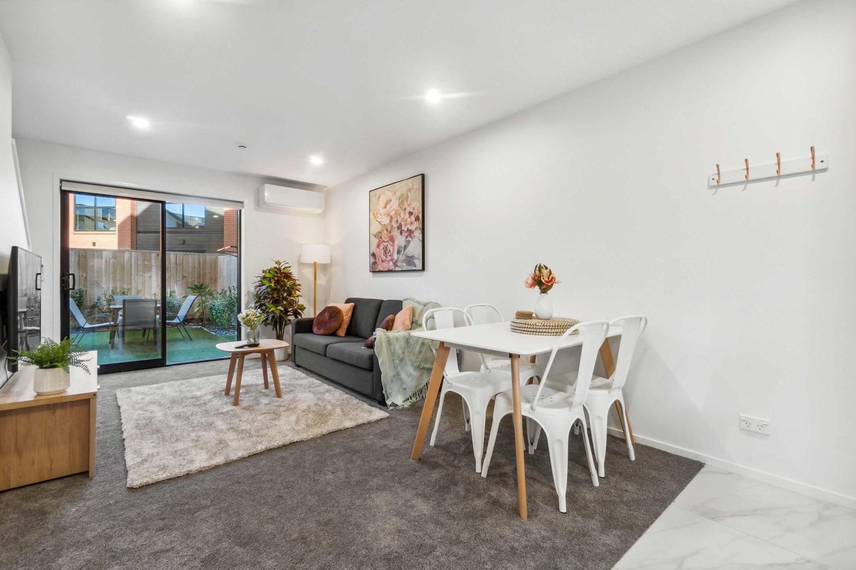 Chic 2-BR Haven with Relaxing Patio and Modern view 3