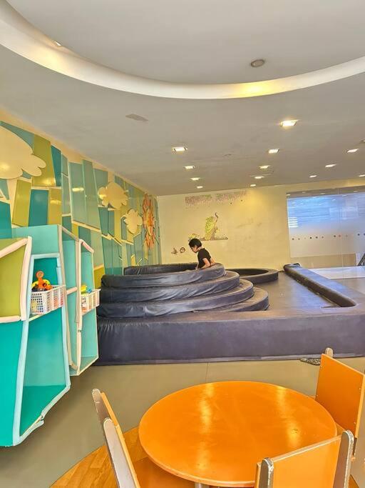 Elivion Staycations at McKinley Hill, near Venice, BGC, with Pool & Wifi view 2