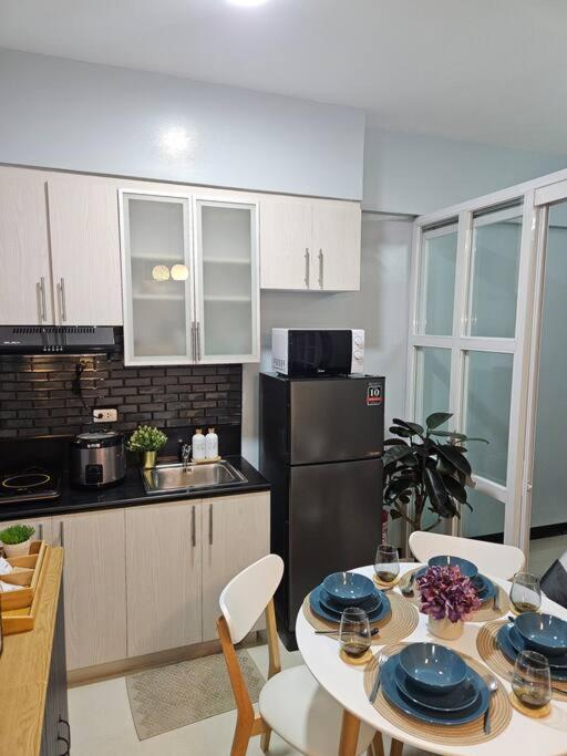 Elivion Staycations at McKinley Hill, near Venice, BGC, with Pool & Wifi view 3