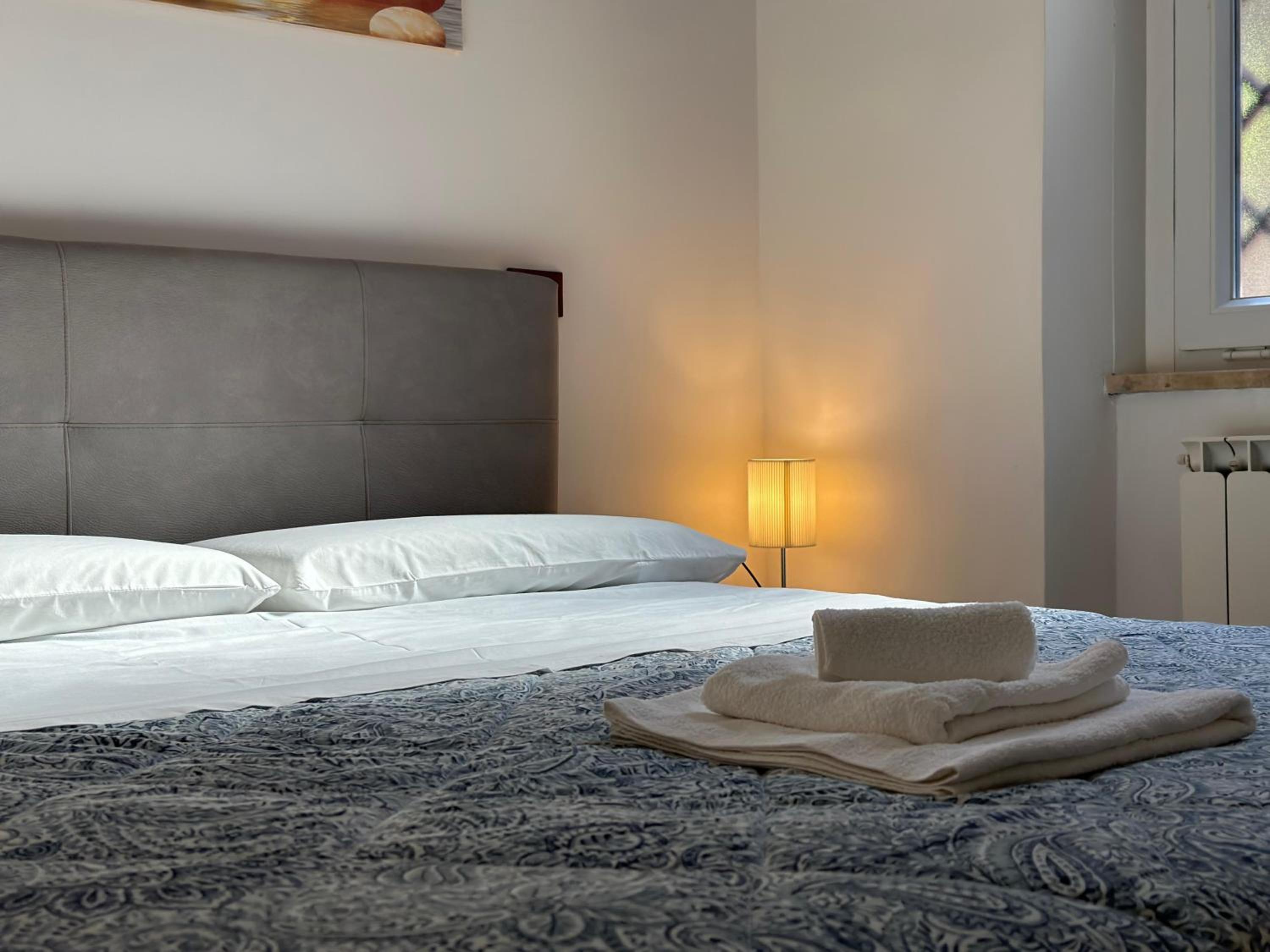 Sweet Home Lunì en Vitinia — bedroom