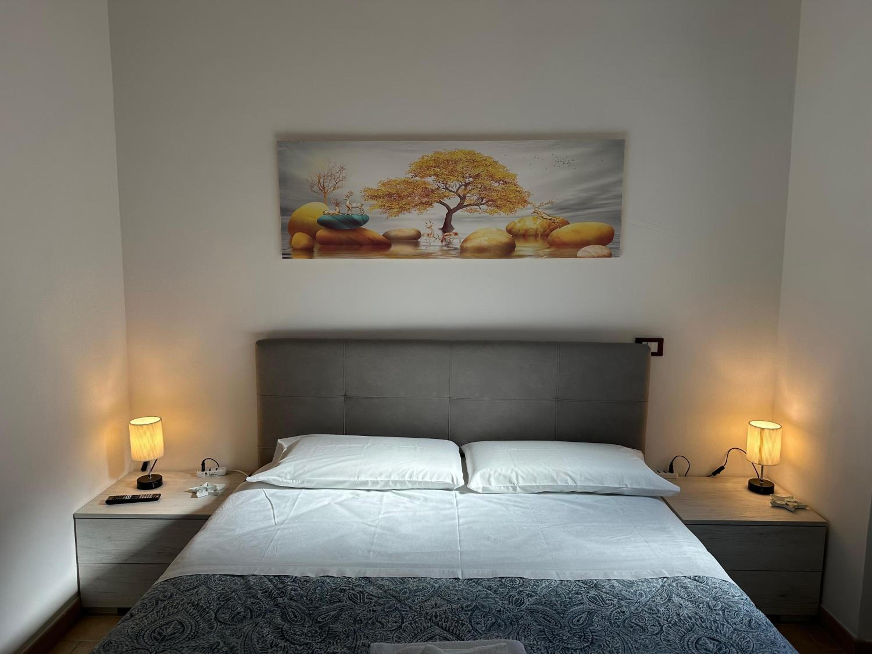 Sweet Home Lunì en Vitinia — bedroom