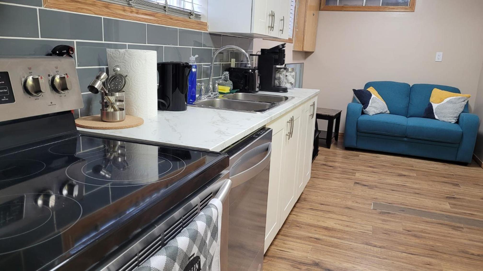 Basement- Elegant 4-Bedroom Family Home 2