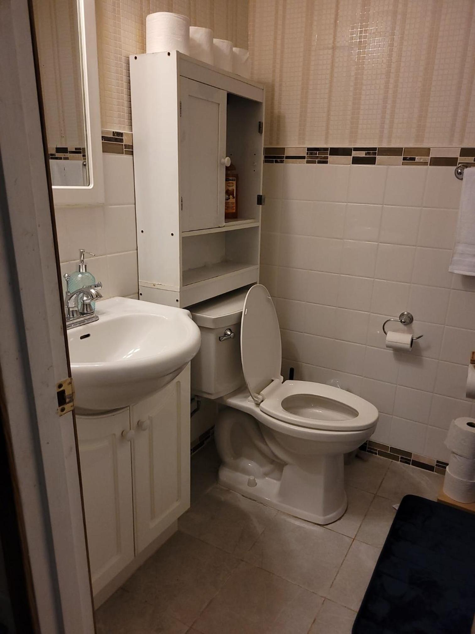 Basement- Elegant 4-Bedroom Family Home 2