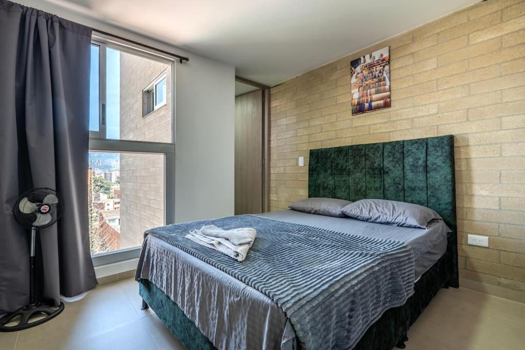 Apartamento en Laureles 2BR con rooftop y piscina 702