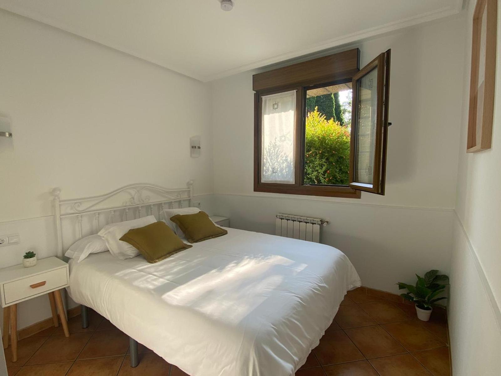 Apartamento familiar con jardín y parking privado