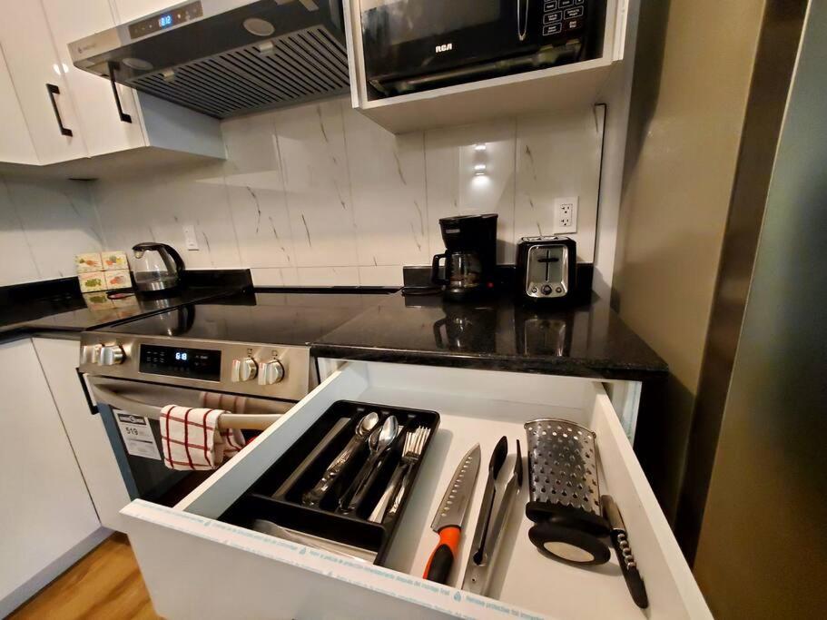 Cozy Haven 2 bedroom Basement apartment with Treated water