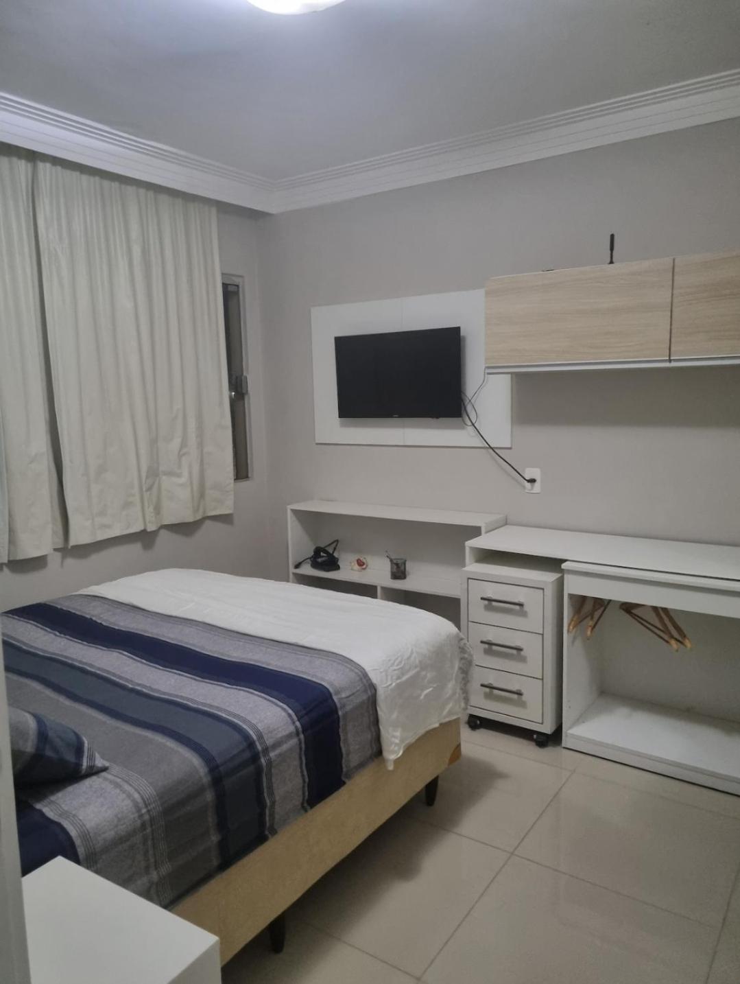 Quarto ar condicionado,praia,centro de convenções 'casa compartilhada '
