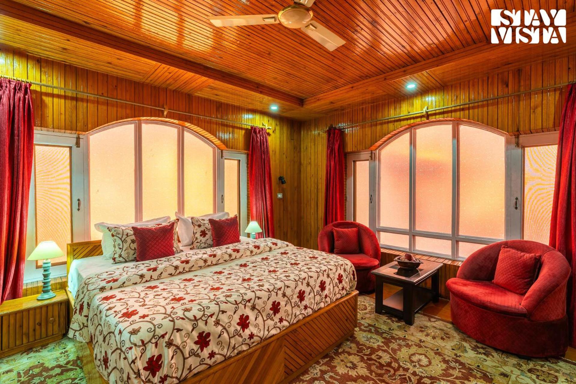 StayVista at Wooden Arches with Lawn, Jacuzzi & BBQ view 5