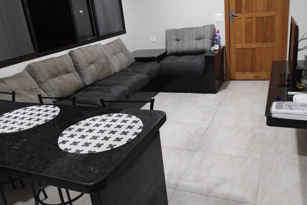 Casa Itanhaém em Condomínio pé na Areia