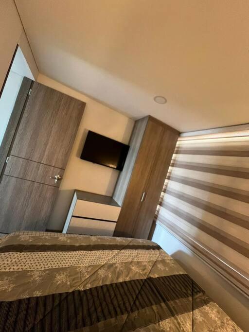 Apartamento cerca al areopuerto con terraza