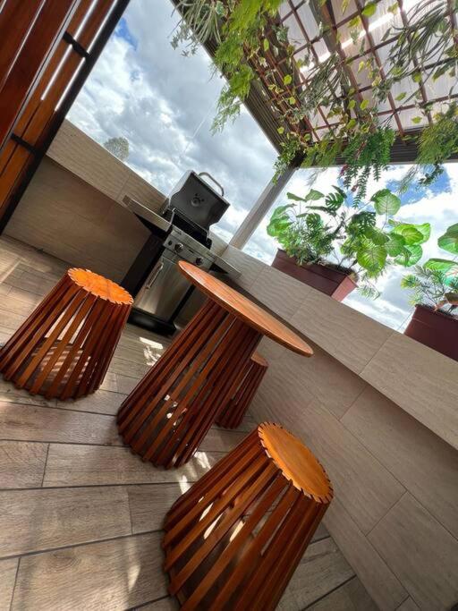 Apartamento cerca al areopuerto con terraza