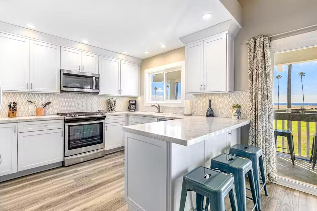 Stunning 2nd Floor Beachfront Home with Balcony, Ocean Views, and Prime Location view 5