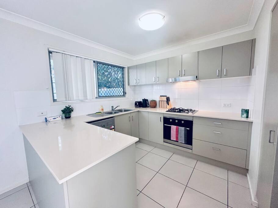 Calm Hideaway - Townhouse with Pool Access & Garage