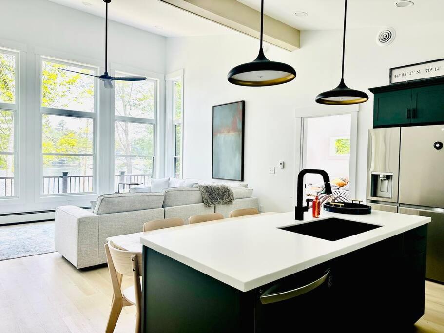 Luxe Modern Lakefront Oasis - Hot Tub, Sunset Views, Pet & Family Friendly! Close to UMF! view 2