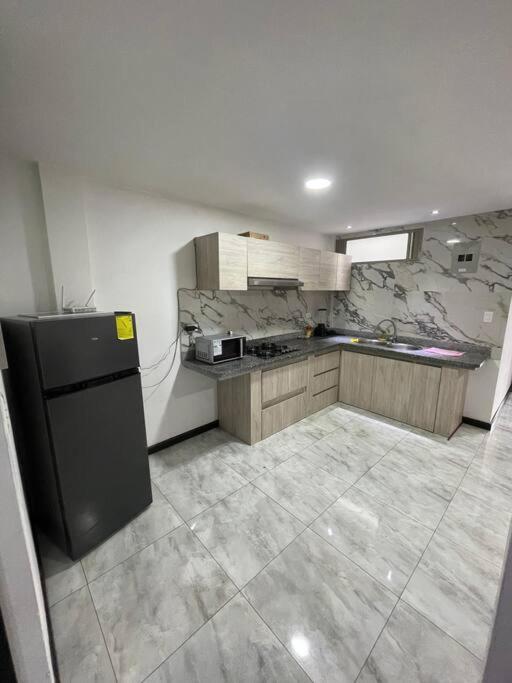 Cómodo Apartamento cerca del Aeropuerto