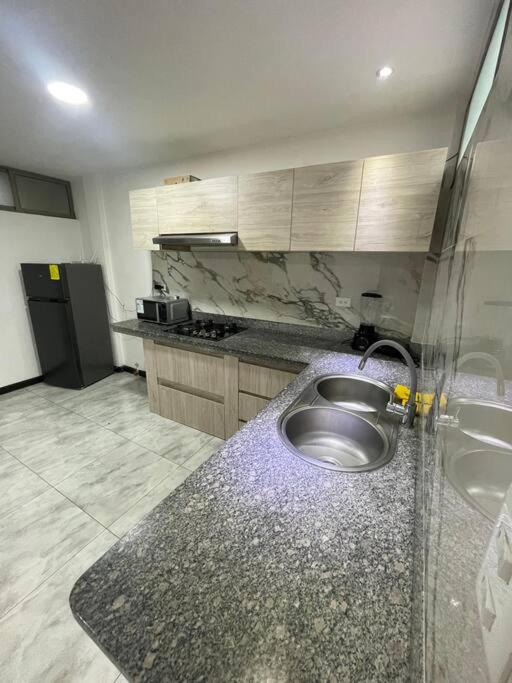Cómodo Apartamento cerca del Aeropuerto
