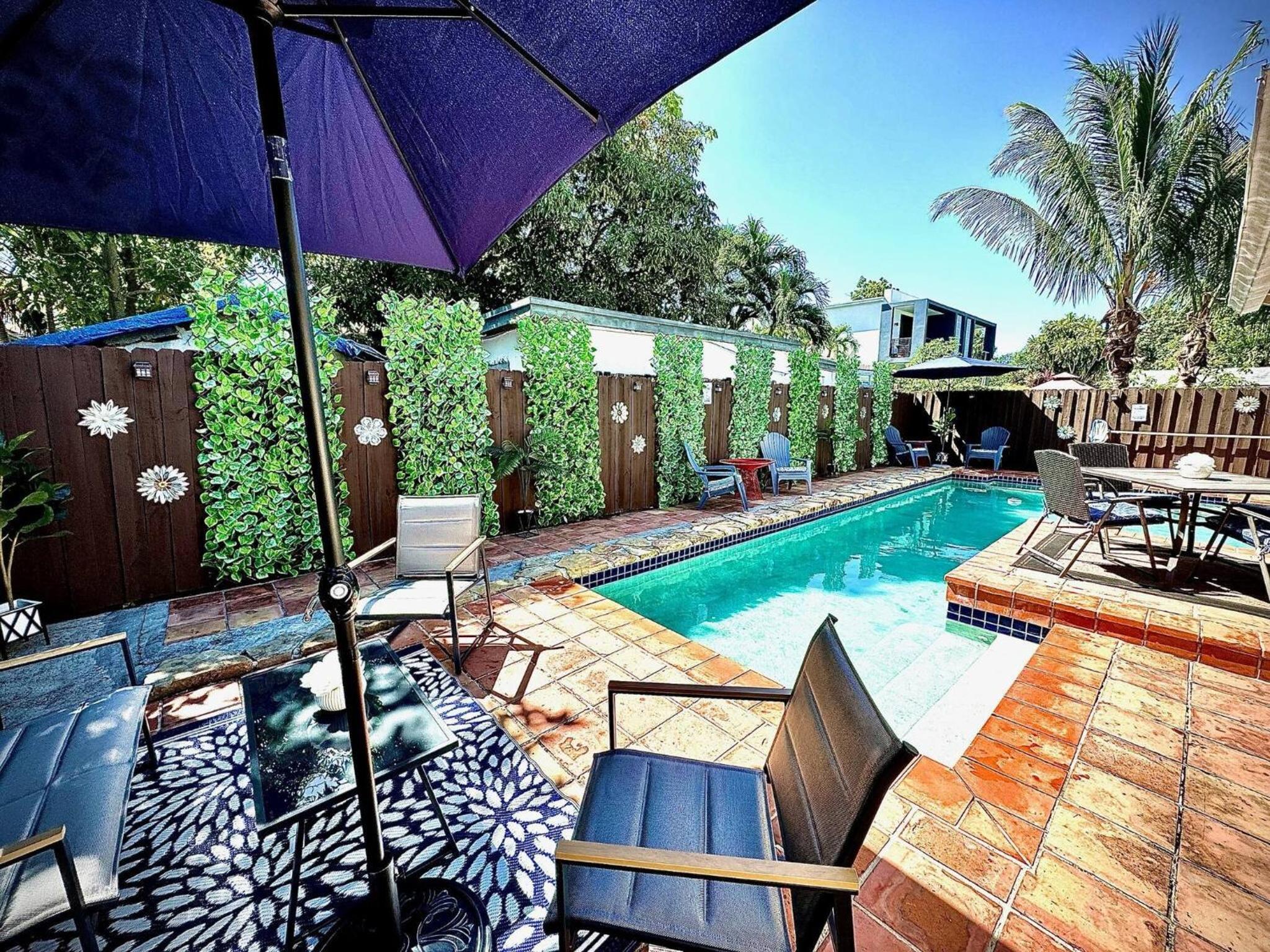 Stay Central: Relax in Our Heated Pool Oasis