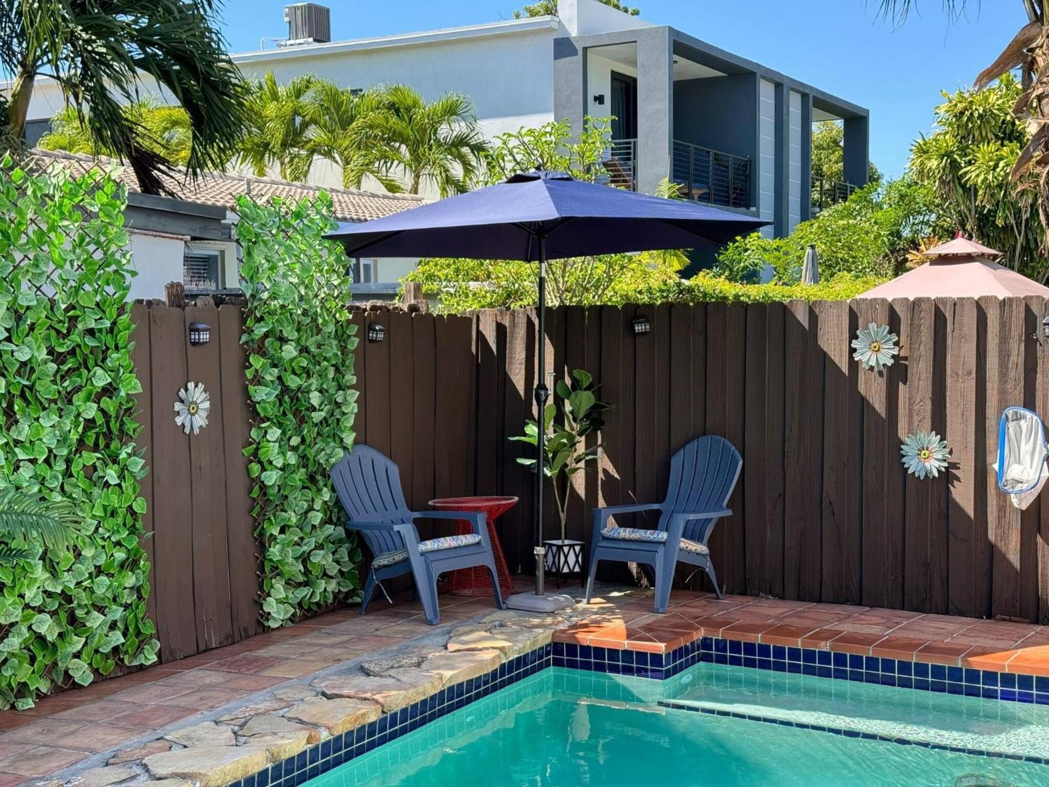 Stay Central: Relax in Our Heated Pool Oasis