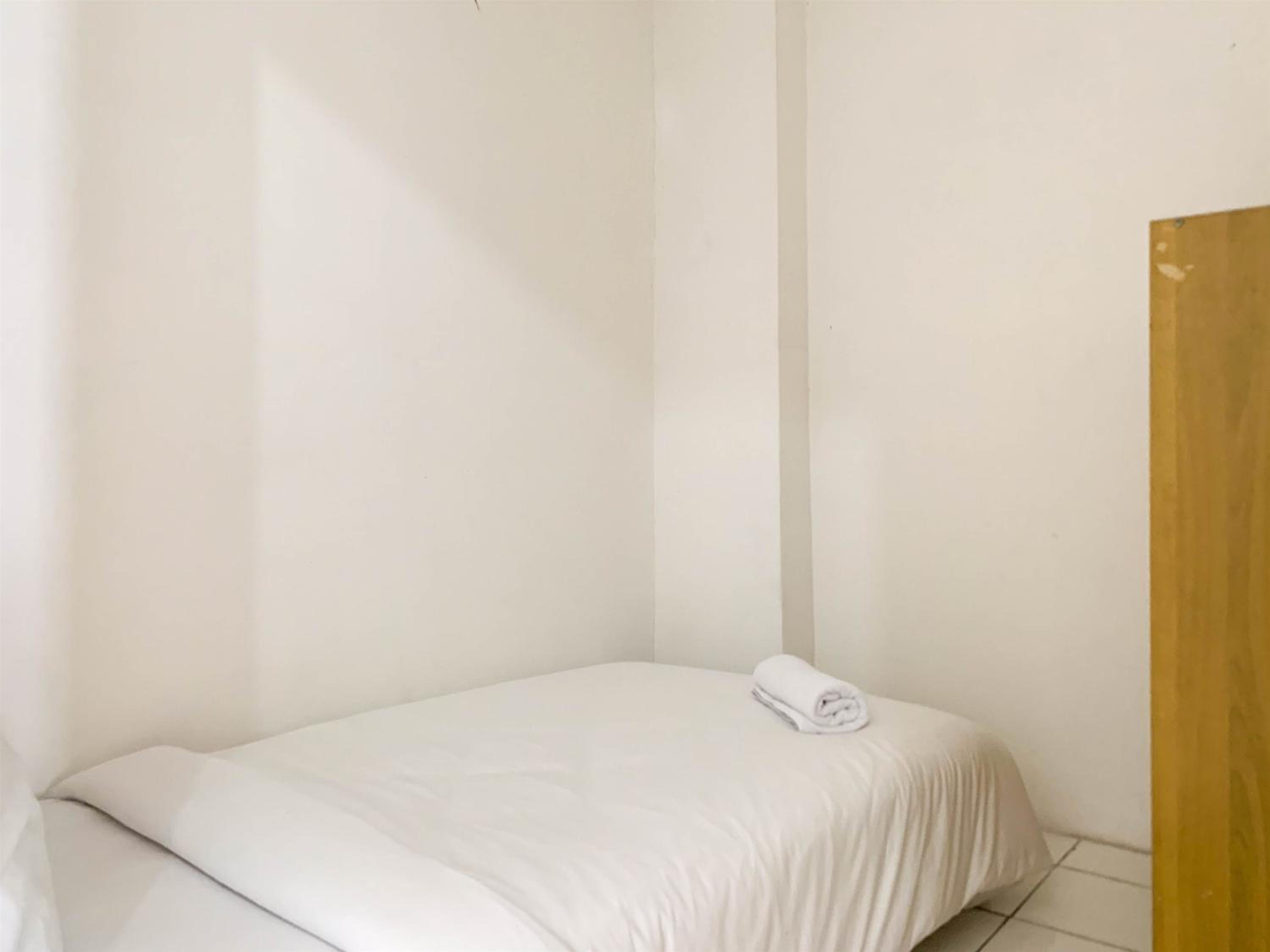 Cozy 2BR at Delta Cakung Apartment By Travelio view 5