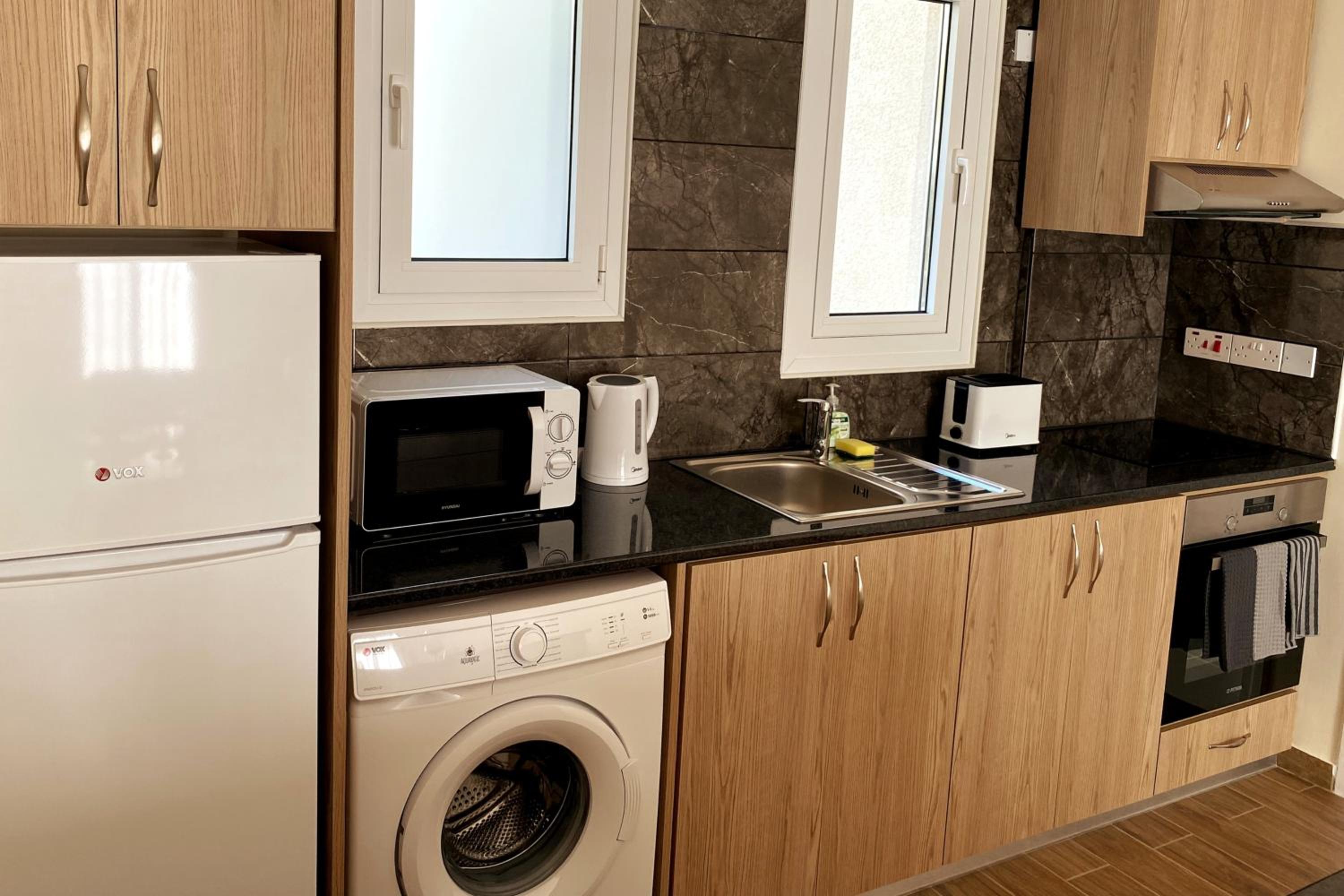 Danaos Seaside Suite 002 with Pool in Tourist Area