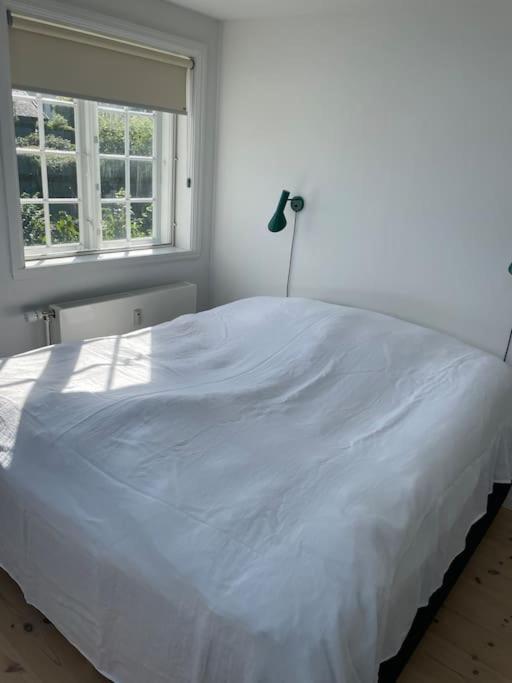 Smuk lejlighed med sundkig lige ved stranden