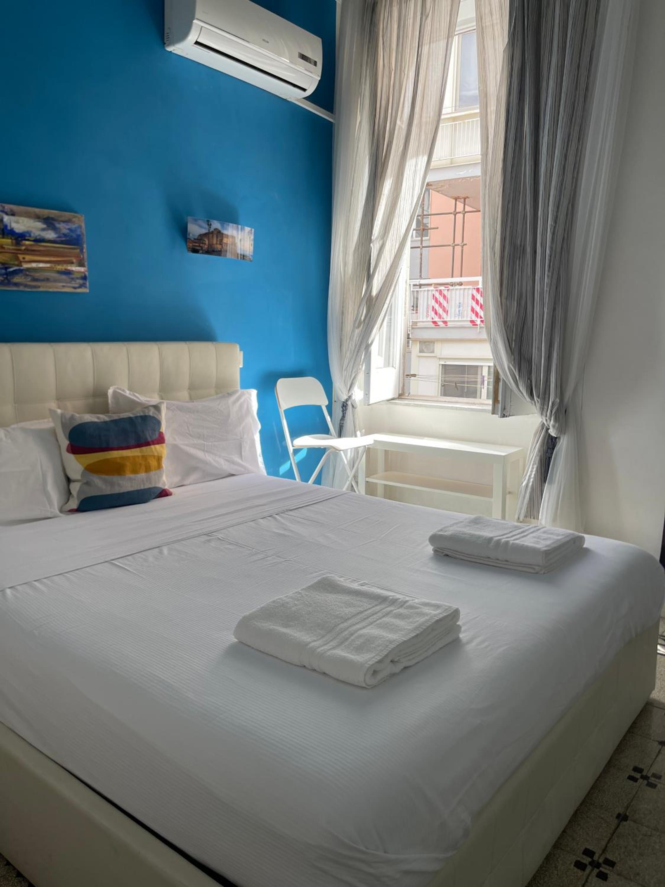 Lesuite en Naples — hotel room