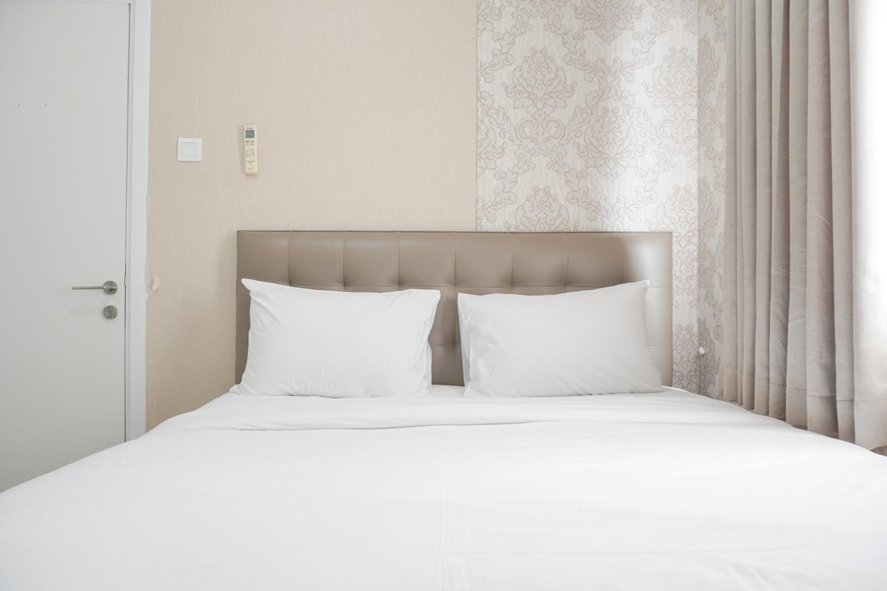 Cozy and Well Designed 2BR at Green Pramuka City Apartment By Travelio view 5