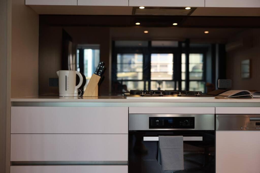 Cool City View 2BR Central with Pool and Free Parking