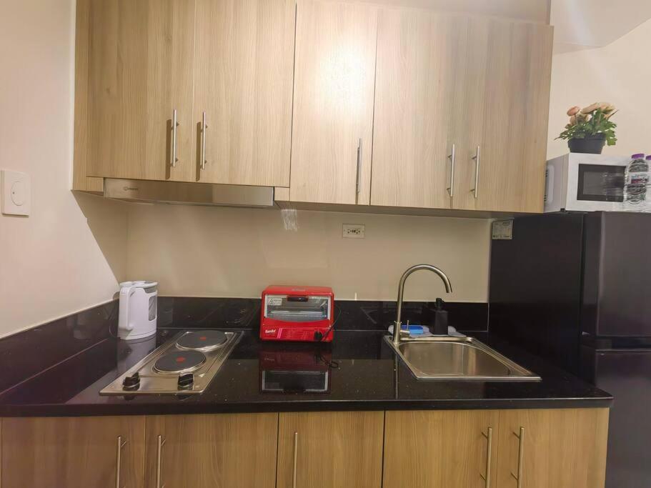 1BR Condotel with Balcony at FAME Residences #FM37 view 3