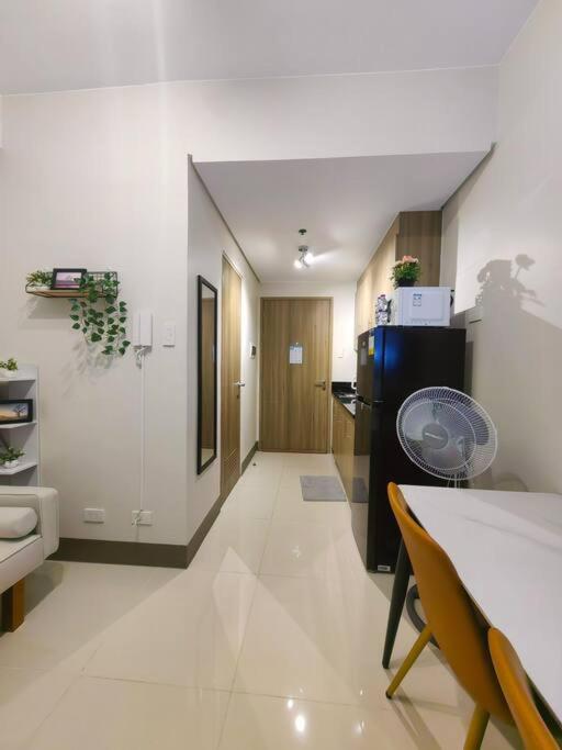 1BR Condotel with Balcony at FAME Residences #FM47 view 2